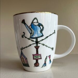 White and Blue Bone China Teacup with Whimsical Garden Design